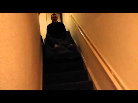 Lee pritchard flying on the stairs on an air bed