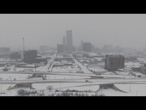 Winter storm dumps ice and snow on several cities across the south and midwest