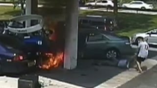 Raw: Officer Saves Man From Gas Station Blast