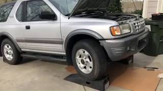 Isuzu Amigo Rodeo starter solenoid clicking? Locating starter on 3.2 liter V6