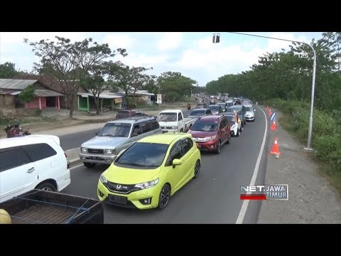 NET. JATIM - PENUMPUKAN KENDARAAN DI JALUR MADIUN - SURABAYA