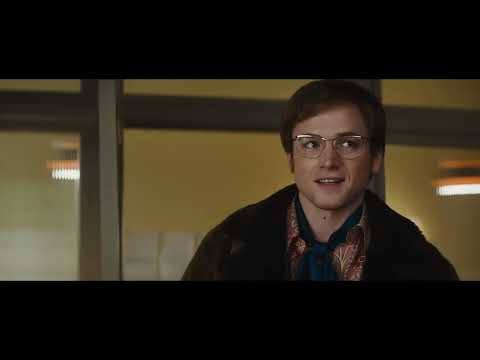 Rocketman trailer still: Elton’s rhinestone devil costume marching into a rehab room