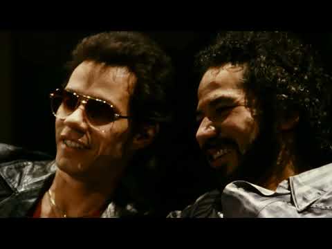 El Cantante trailer frame: Marc Anthony as Héctor Lavoe onstage with a Fania-style horn section