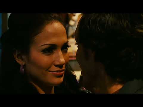 Trailer frame: nightclub crowd in golden light as the band locks into clave
