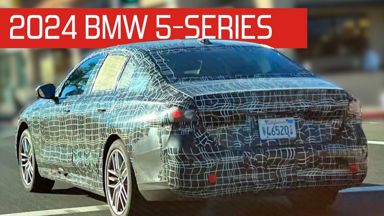 2024 BMW 5 series spied on the road with camouflage facade placeholder