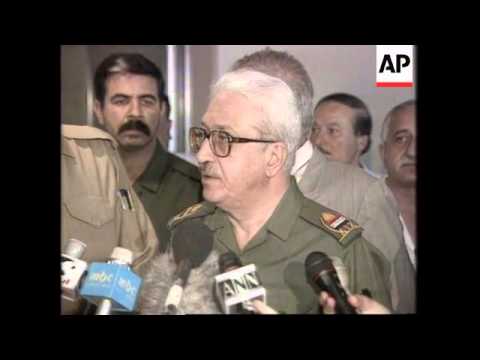 Iraq - Aziz denounces Butler amidst weapons talks