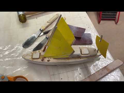 Laminating the place where the CB was. Also getting ideas of the mizzen mast.