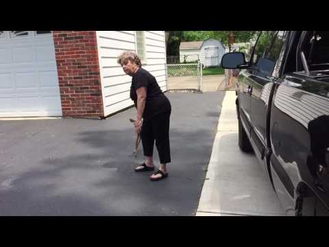 Fawn coaxed out of fenced yard