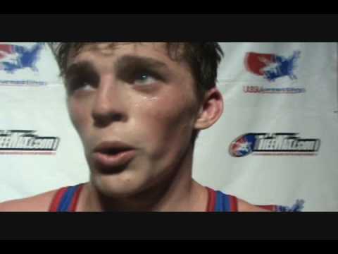Cadet Freestyle 119 lbs. champion Kagan Squire of Ohio
