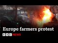 Farmers set fires in Brussels ahead of Agriculture Ministers meeting | BBC News