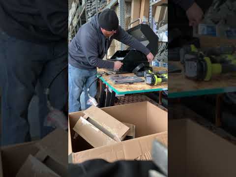 How to unbox, set up and assemble a Dyna glo 4 burner grill.