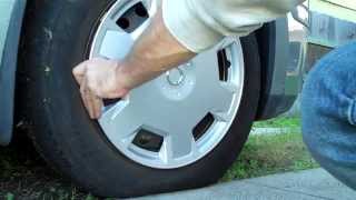 Replacing the Hubcap on a Nissan Versa