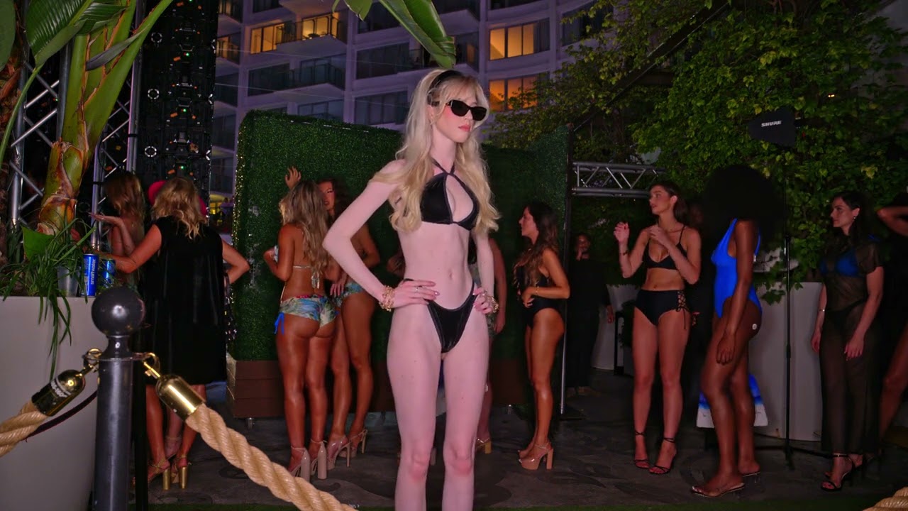 Model poses backstage for photographer at MSWTS