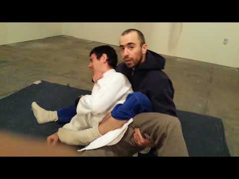 Bow and arrow from back mount