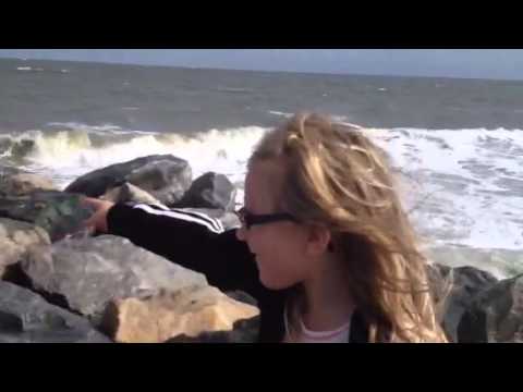 Little Girl giving beach weather report