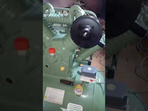 Reciprocating air compressor