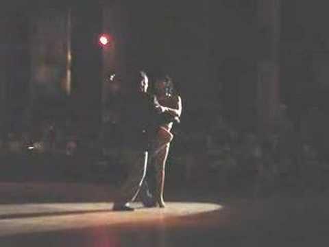  Esteban Moreno  and  Claudia Codega  are  dancing  to  the  tango  "  Zum  "