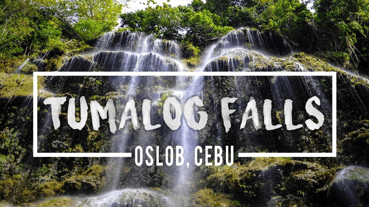 A silky cascade veils the cliffs - Tumalog Falls in full cinematic flow.