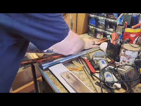 How I radius a fretboard with pearl inlays.