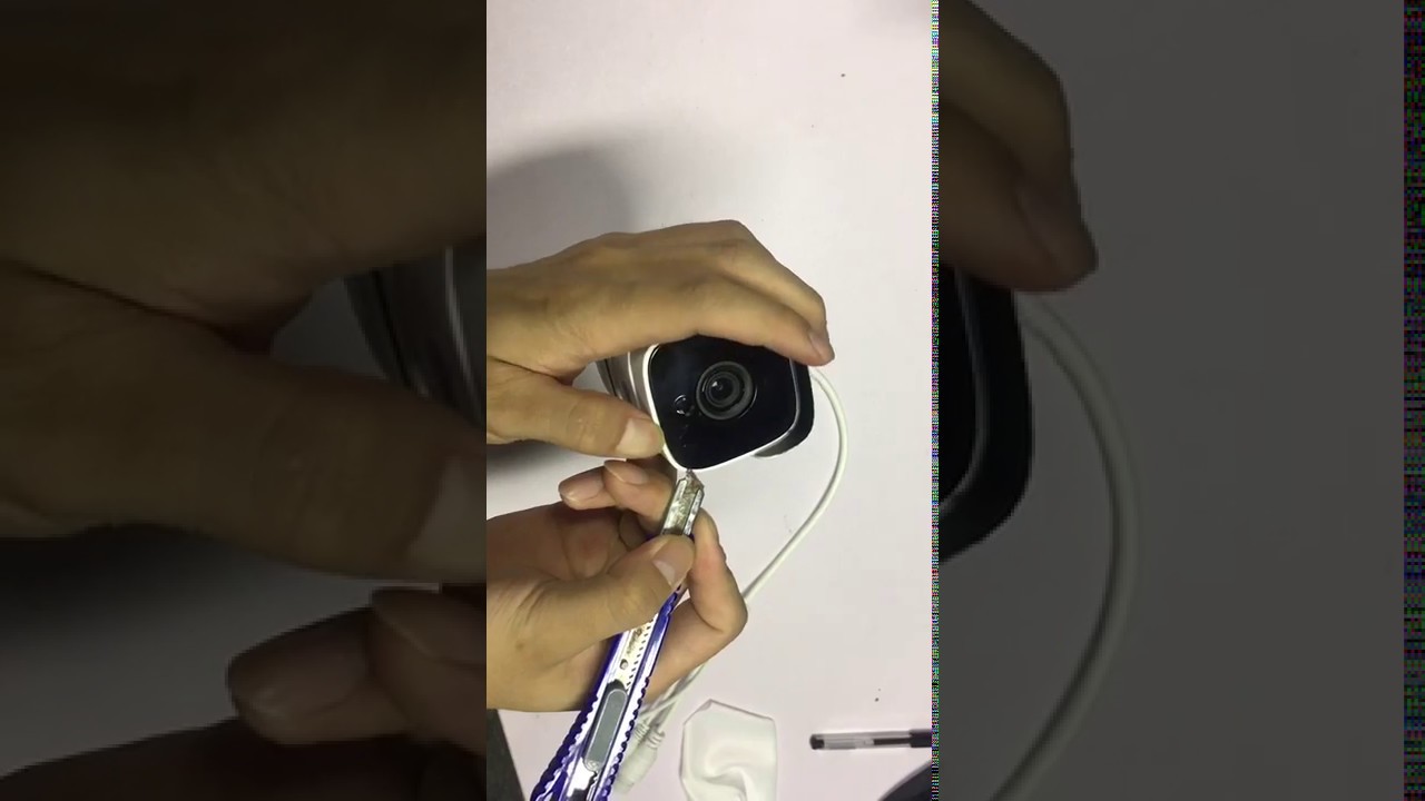 how to open the front lid of the camera and clean the lens? (SY2L 1080P wireless outdoor IP camera)