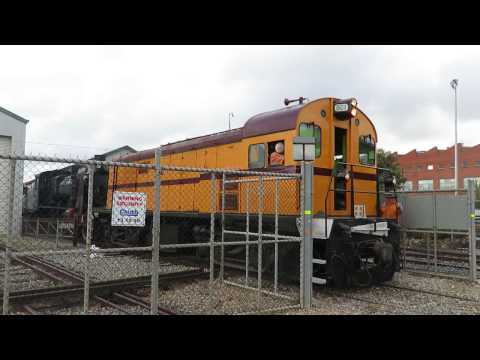 Loco 801 hauls steam engine & freight cars