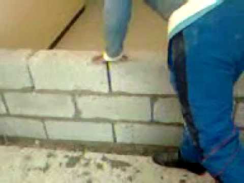 comment construire mur en brique