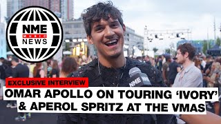 Omar Apollo on touring 'Ivory', Aperol Spritz, and the "lit" green room at the VMAs