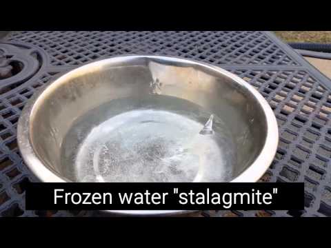 Frozen water stalagmite in dog's water bowl