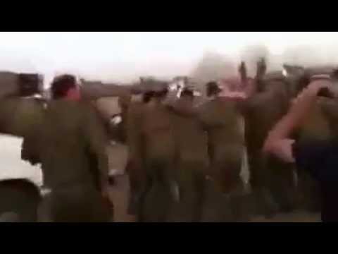 Breslever chassidim dancing with the IDF