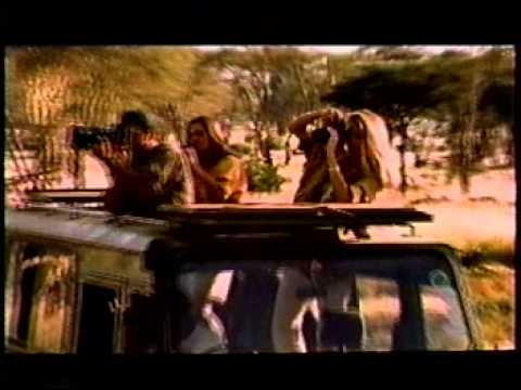 Visa - "How do you stop a rhino from charging?" (Commercial - 1997)