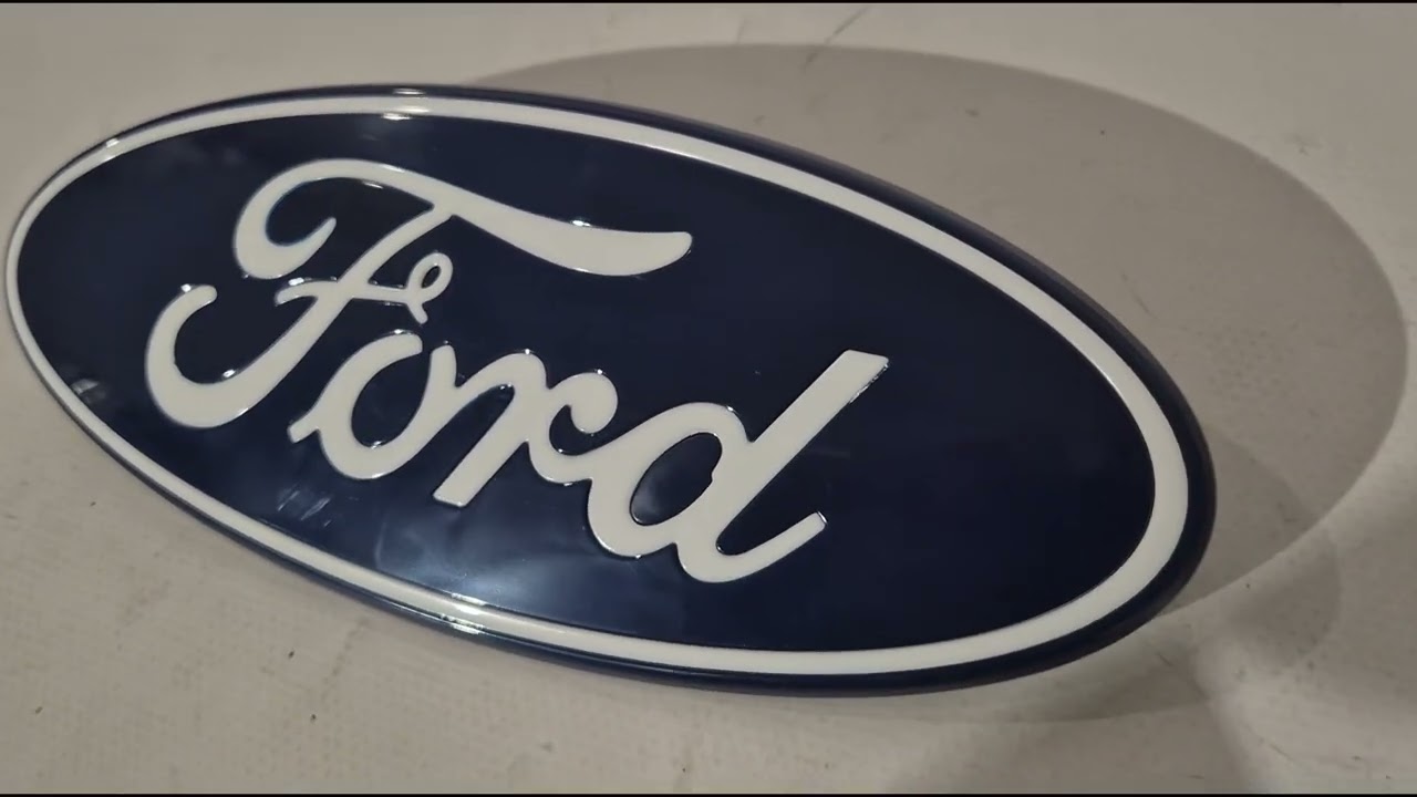 Ford Transit 2014- гг. Передняя эмблема 2024+ 144 мм/61 мм (самоклейка + штифты) Видео 5