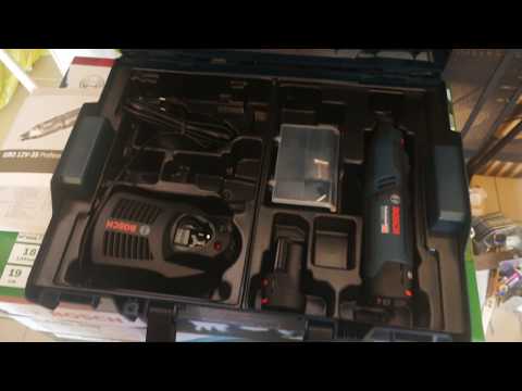 Unpacking / unboxing cordless rotary tool bosch gro 12v-35 0...