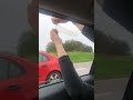 Guy In Car Condom Balloon