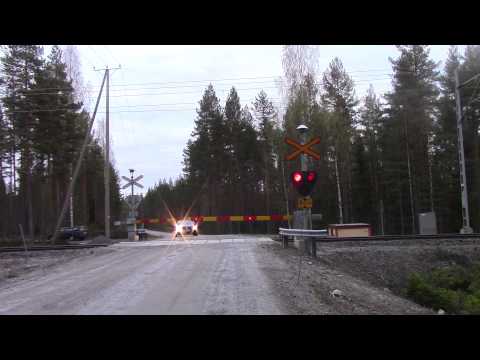 Freight train T 3479 passed KOVALA (Km.0414+0398) level crossing in Hankasalmi, Finland