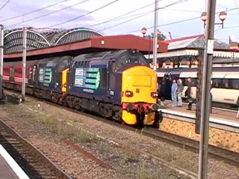 DRS class 37's Nos. 37218+37059 thrash out of York with the ''The York + Durham Excursion'' 18-8-11.