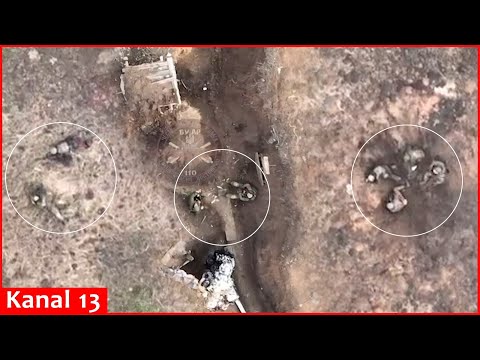 DRONE’S “GIFT” for Russians gathering ammunition in trench in Avdeyevka and preparing for an attack
