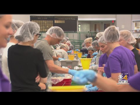 Hundreds of volunteers package meals for Greater Boston Food Bank during 9/11 day of service
