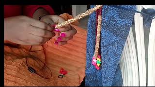How to put beads on braids using only a string