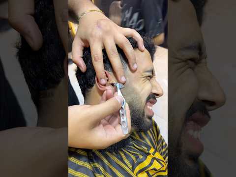 Removing ingrown hair from the ear✂️😂#explore #barber #eidmub #viral #haircut #barbershop #ukbarber