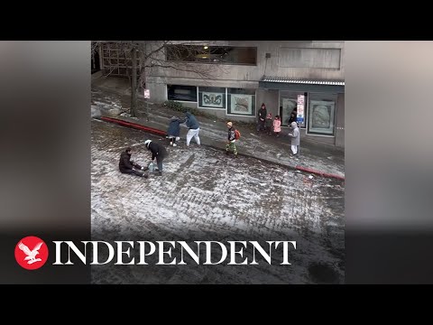 Icy Seattle hill proves comically impossible for pedestrians to walk up