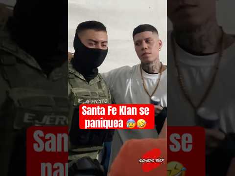 The STRANGE look the SANTA FE KLAN gave this soldier 😂