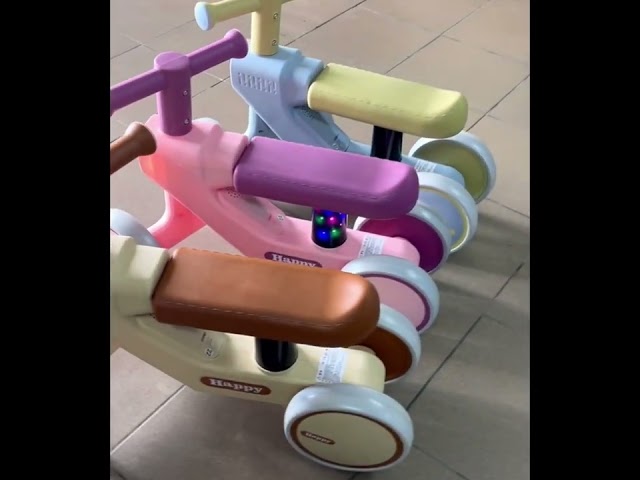 Дитячий толокар "HAPPY" Рожевий з музикою та підсвіткою