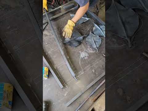 Forging a heavy iron bar in the blacksmith shop with my vintage tire roller! #blacksmith #artist