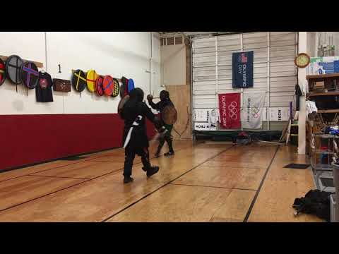 Falchion and shield vs single stick and shield