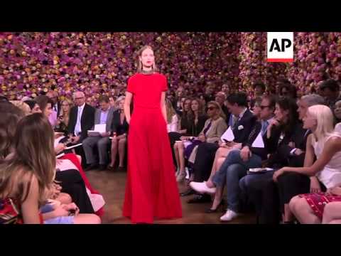 Flowers and bold colors permeated Raf Simon's debut collection for Dior at Paris Fashion Week