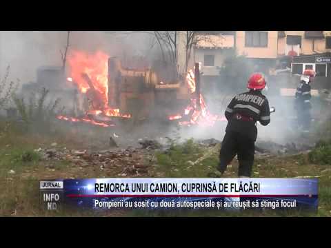 REMORCA UNUI CAMION, CUPRINSĂ DE FLĂCĂRI