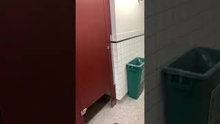 How to open bathroom stall door