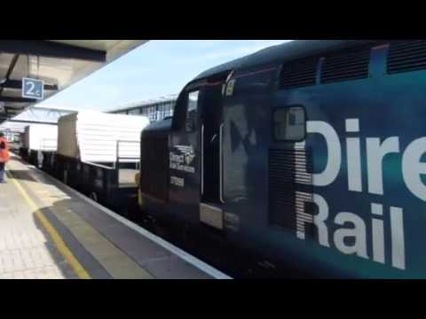 DRS class 37059 leads 37069 through Ashford with the nuclear flask.