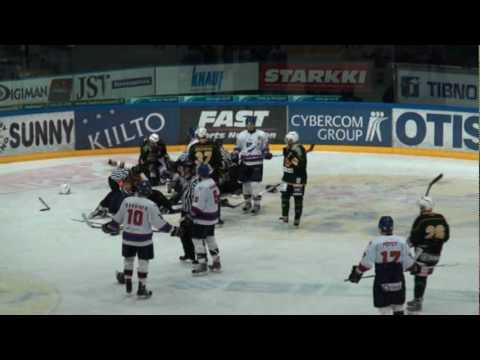 Patrik Moisio vs Saku Salmela Hockey Fight In SemiFinal game 14/03/2010
