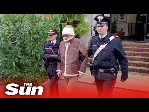 Mafia boss Messina Denaro detained and lead away by police in Sicily